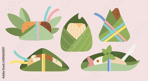 Assorted traditional dumplings wrapped in leaves with colorful ribbons.