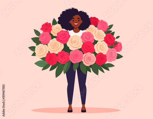 Happy woman holding a huge bouquet of pink and red roses, smiling brightly.