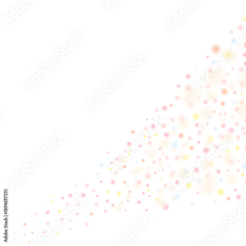 ピンクとオレンジの淡い粒が斜めに流れる抽象背景