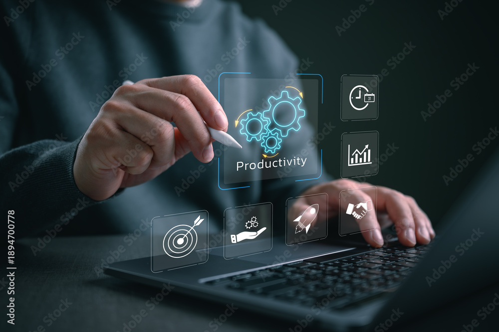 Fototapeta premium Everyday user interacting with an AI productivity dashboard on a laptop, showing workflow automation, performance optimization, task management, data-driven efficiency accessible to everyone.