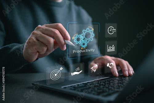 Fotografía Everyday user interacting with an AI productivity dashboard on a laptop, showing workflow automation, performance optimization, task management, data-driven efficiency accessible to everyone