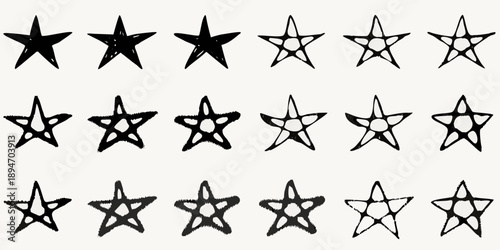 Collection of hand drawn black stars in varying styles and sizes