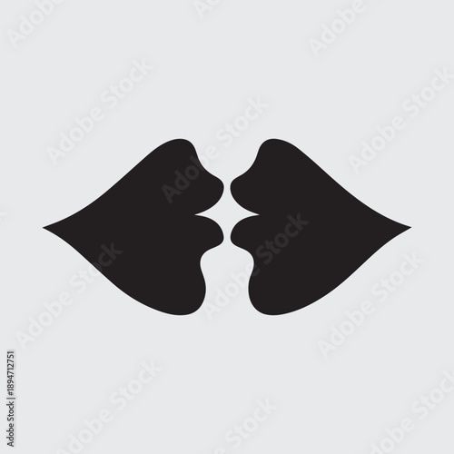 A striking silhouette of a pair of lips conveying affection and romance