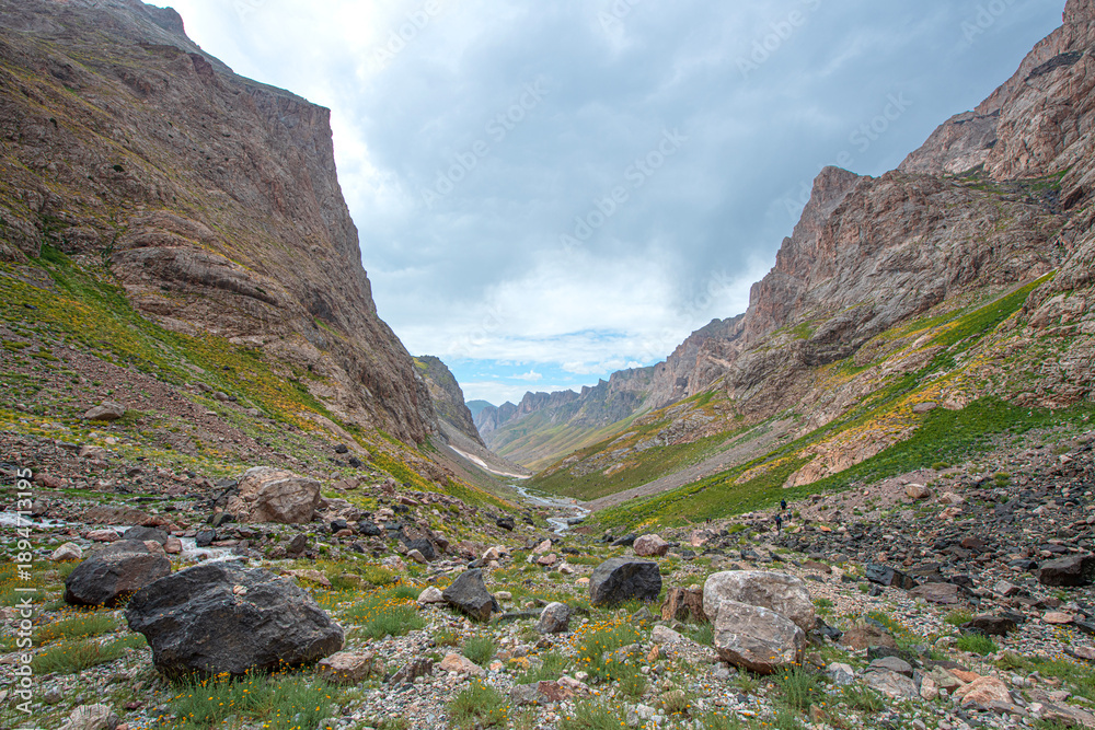Fototapeta premium Heaven and Hell Valley. Cilo Mountains, Hakkari, Heaven and Hell Valley. Streams formed from glaciers. The magnificent Heaven and Hell Canyon. Amazing trekking routes in Hakkari. Turkey. 