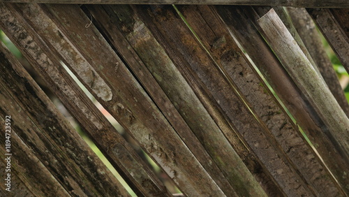 old cement wall background, and dark brown woven bamboo background