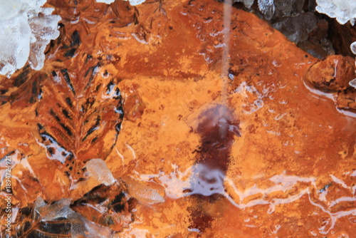 Vivid red texture of the water, reach with iron.