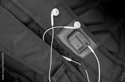 USB port on the backpack strap with headphones connected