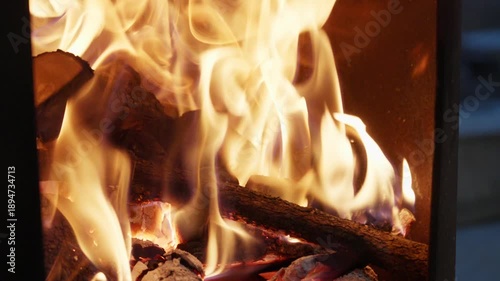 Charcoal burning fiercely in the hearth