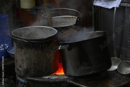 Cooking Pots on an Outdoor Stove at a Street Food Market in Hanoi, Vietnam