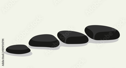 Four smooth, dark stones arranged in ascending order on a light background