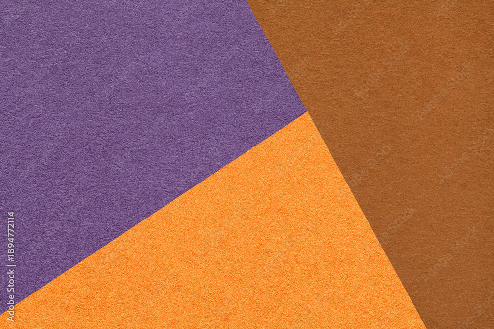 Fototapeta premium Geometric triangular orange brown violet textured paper background with copy space for banner template