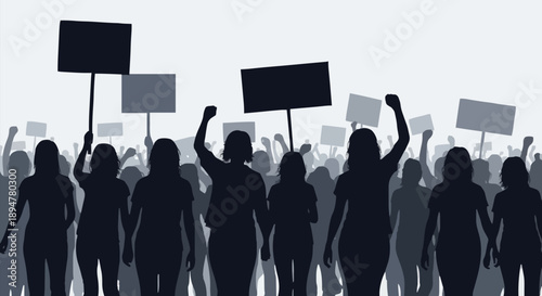 Protestors holding signs in a crowd.