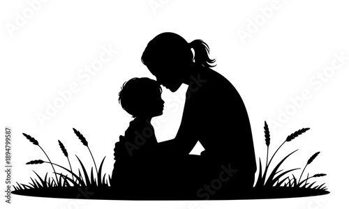 Silhouette of a loving mother embracing her young child in a grassy field during sunset, capturing a peaceful moment of parenthood, maternal bond, nurturing care, and family love.