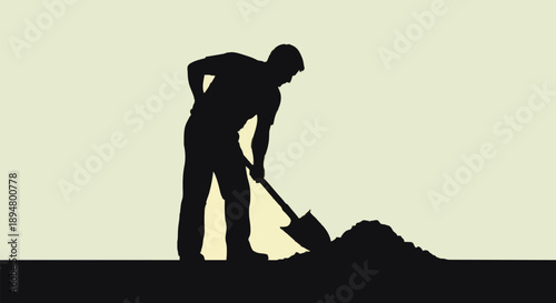 Silhouette of a man digging with a shovel in the dirt.
