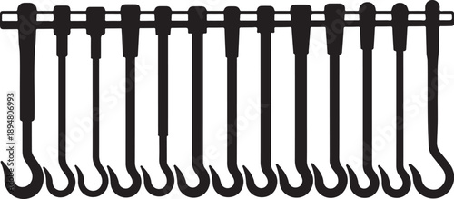 Collection of black hooks hanging from a metal rod