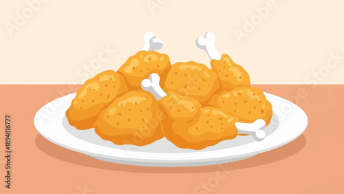 A plate piled high with golden-brown fried chicken pieces, ready to eat