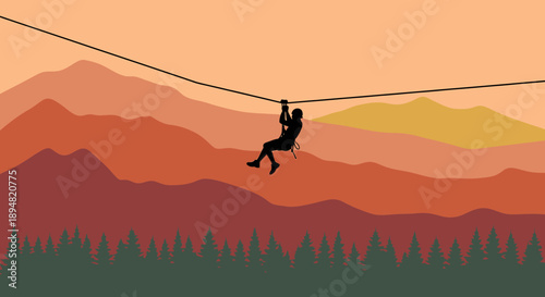 Person ziplining through mountains at sunset with trees below.