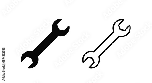 Two wrenches one solid black and one outlined presented as a silhouette