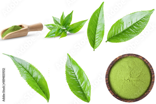 vibrant green matcha tea leaves and fine powder in a wooden scoop and bowl, isolated on a dark background.