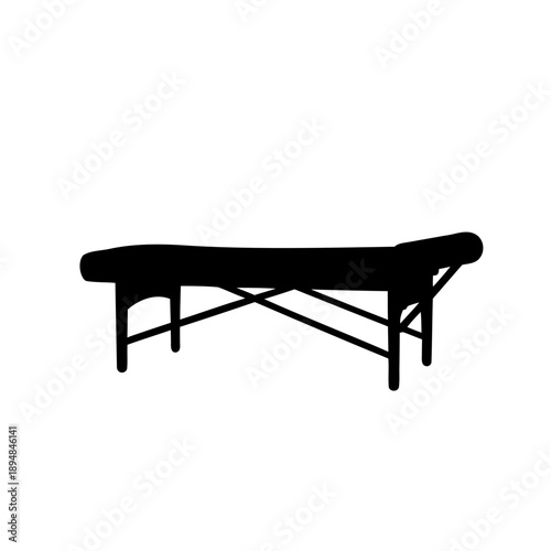 Silhouette of a massage table with a headrest on a white background