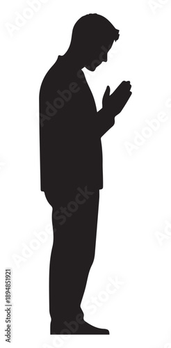 A man looking at his phone with a bowed head black silhouette