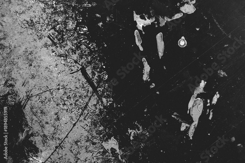 Abstract Distressed Monochrome Surface with Scratches and Splatters