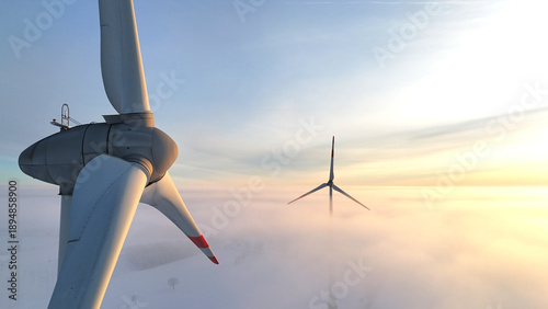 Tableau sur toile Lower Saxony, Germany - January 11, 2026: Wind turbine at sunset during winter t