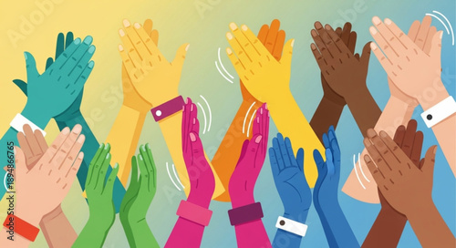 Diverse group of people clapping hands together in celebration.