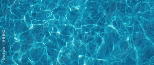 Panel kuchenny z motywem Dark blue pool water featuring shimmering sunlight patterns