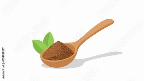 A wooden spoon filled with brown seeds, beside green leaves