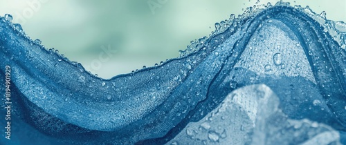 Water drops on waterproof material - close-up with short depth of field