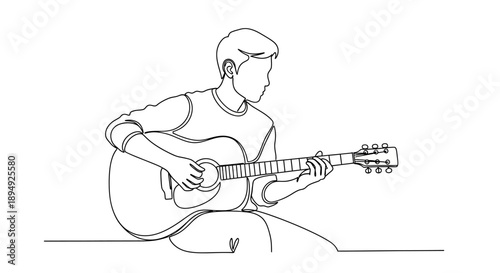 Man Playing Acoustic Guitar Sitting Down.