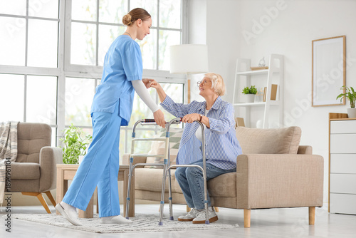 Nurse helping senior woman ...