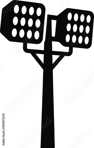 Modern stadium floodlight tower shining bright at night