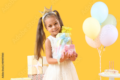 Cute little girl with gift ...