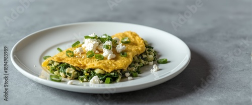 Omelette featuring spinach,...