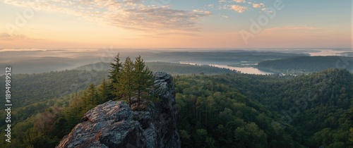 At the summit of a towering...