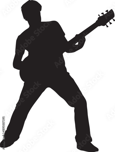 Silhouette of a Male Musician Playing Electric Guitar Standing Position