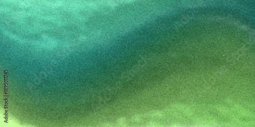 An abstract blurred background with shades of green and blue creating a soft and calming visual effect