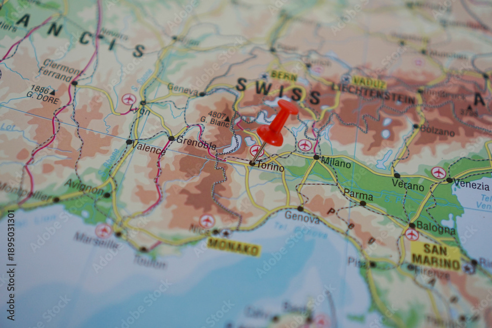 Obraz premium view of Torino, Italy on a geographical map of Europe, marked with red pushpin