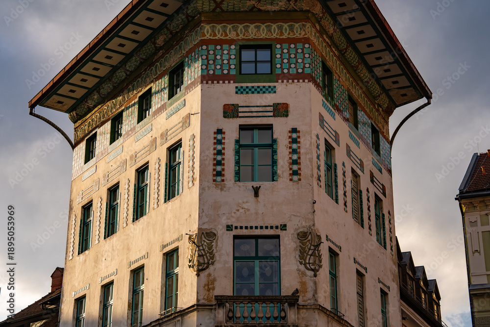 Obraz premium Close-up details of artistic building facades in Slovenia, showcasing decorative architecture and craftsmanship. Ljubljana, Slovenia 01.01.2026 