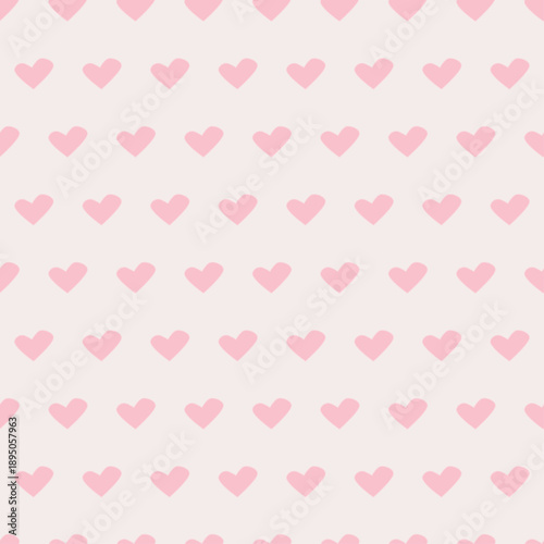 Seamless pattern of pink hearts on a light background
