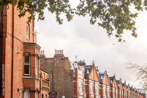 LONDON - Parsons Green New King's Road Victorian Houses – Autumn Foliage Framing Classic Fulham Red-Brick Terraces