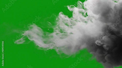 Abstract cloud of smoke billowing against a vibrant green background