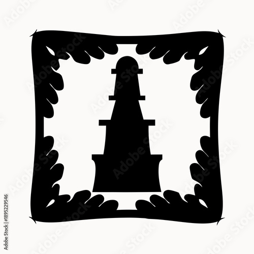 A black silhouette of a castle tower with a decorative border