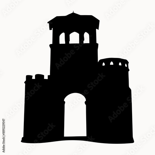 A black silhouette of a medieval castle with towers and archway