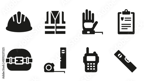 Essential construction and safety equipment icons set in black silhouette style