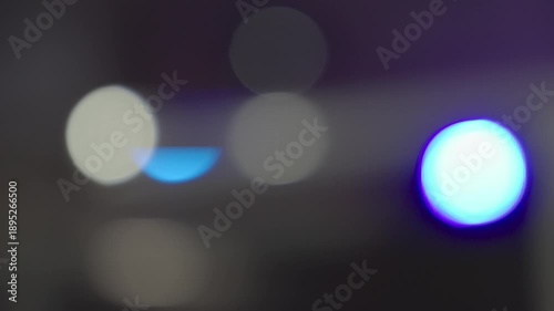 Creative bokeh background featuring police siren colors for security and safety concepts