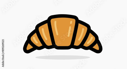 A delicious golden brown croissant pastry on a plate in a bakery