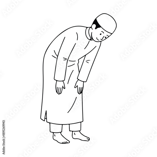 Muslim man in traditional clothing performing ruku bowing position during islamic prayer